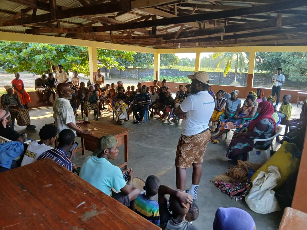 Community members in a discussion about child protection